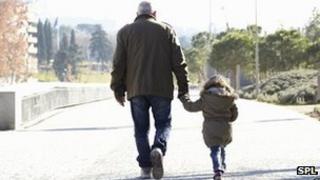 Father and daughter walking