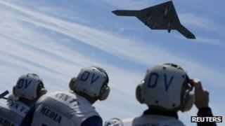 An X-47B drone combat aircraft is launched for the first time off an aircraft carrier, the USS George H. W. Bush, in the Atlantic Ocean off the coast of Virginia, May 14, 2013