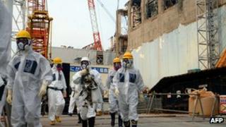 File photo: IAEA inspectors at the Fukushima Dai-ichi nuclear power plant, 17 April 2013