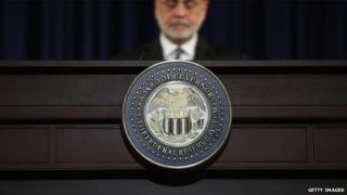 US Federal Reserve chairman Ben Bernanke behind a lectern