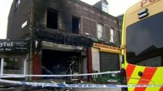 The fire-damaged shop