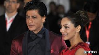 Actor Shah Rukh Khan and his wife Gauri Khan arrive for the inaugural Times of India Film Awards in Vancouver
