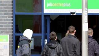 Men entering a Job Centre plus office in Gateshead