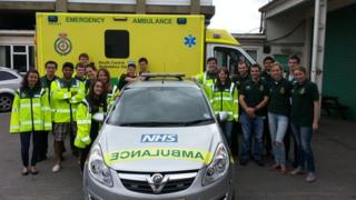 Medical students with their emergency response vehicles