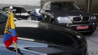 Two cars can be seen outside the Moscow airport terminal where Edward Snowden landed on Sunday 23 June 2013