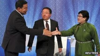 Tsakhia Elbegdorj (C), Badmaanyanbuu Bat-Erdene (L) and Natsag Udval at a television debate in Ulan Bator, 24 June 2013