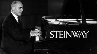 Solomon playing a Steinway