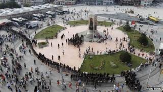Turkish police take position ahead of an anti-government protest at Taksim Square in Istanbul on 29 June 2013