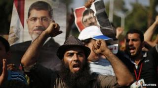Supporters of deposed Egyptian President Mohammed Morsi protest in Cairo 6 July 2013