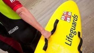 RNLI coastguard on beach