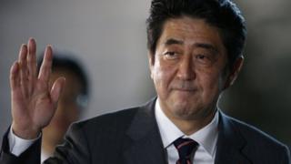China media are criticising Japanese PM Shinzo Abe's military strategy