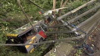 Baroness's tour bus after it crashed through railings in Bath
