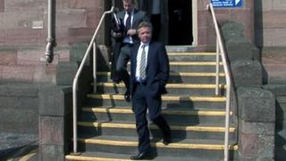 Craig Whyte, front, at Inverness Sheriff Court