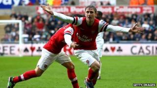 Nacho Monreal celebrates scoring for Arsenal against Swansea
