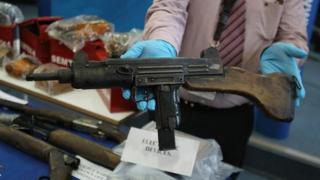 An UZI 9mm sub machine gun was recovered during the searches