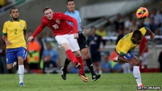 Wayne Rooney scores England's second goal in the international friendly against Brazil in Rio in June