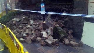 A wall in Arnold collapses after flash floods