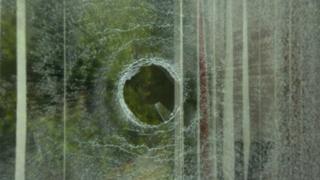The window of a house in Ringford Park that was damaged in the attack