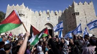 Israeli and Palestinian flags outside Damascus Gate, Jerusalem (file photo)