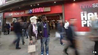 Shoppers outside HMV