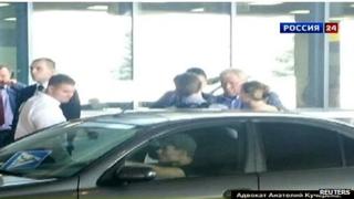 Rossiya 24 TV footage of Edward Snowden leaving Moscow airport