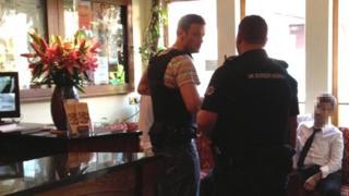 Officers raiding restaurant