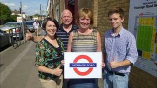 Mayor Dorothy Thornhill holding Vicarage Road sign