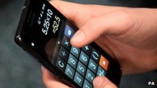 Youngster using a calculator