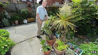 Mike Kelley with the award-winning blooms in Whitley Bay