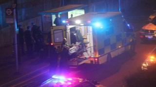Shot man put into ambulance