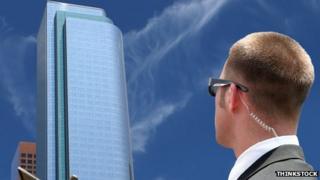 Image of an agent looking at a skyscraper