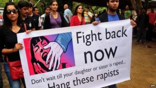 A protest march against the gang-rape of a female photographer in Mumbai on August 25, 2013