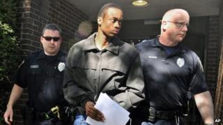 Suspect Daquan Breland is led by police in Wilkes-Barre, Pennsylvania on 6 September 2013