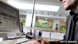 Man sitting at a computer