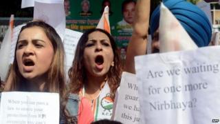 Indian activists shout slogans demanding an amendment of juvenile justice laws during a protest against the sentence of a juvenile convicted in the December 2012 gang-rape of a student,