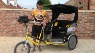 Luke Parry with his rickshaw