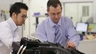Workers at Denso