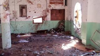 Aftermath of bomb attack in Umm al-Adham, on the outskirts of Baquba (13 September 2013)
