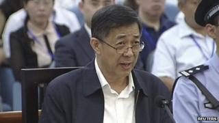 Bo Xilai speaks in a court room at Jinan Intermediate People's Court in Jinan, eastern China's Shandong province, 25 August 2013