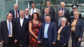 Representatives from Suffolk County Council, other councils in Suffolk and the police outside Endeavour House in Ipswich