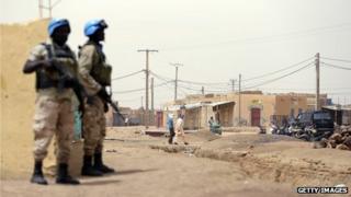 United Nations soldiers patrol on July 27, 2013 in the northern Malian city of Kidal.