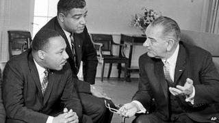 President Lyndon Johnson, right, with Martin Luther King, left, and Whitney Young,