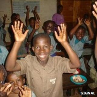 Deaf boy waving his hands