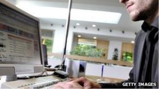 Man sitting at a computer