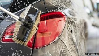 Generic image of car being washed