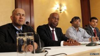 Representatives of mobile phone companies at a joint news conference in Nairobi on 8 October 2013