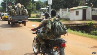 Seleka rebels integrated into the Central African army patrol Bangui, on September 11, 2013