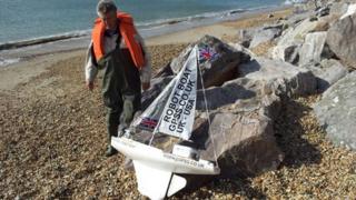 Robin Lovelock on the beach at Barton-on-Sea with his Snoopy Sloop boat