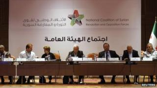 George Sabra, a veteran Christian opposition figure and acting President of the Syrian National Coalition, (C) chairs a meeting in Istanbul on 4 July 2013.