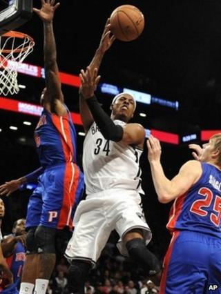 Brooklyn Nets' Paul Pierce (34) grabs a rebound against the Detroit Pistons
